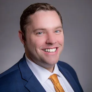 Nicholas M.