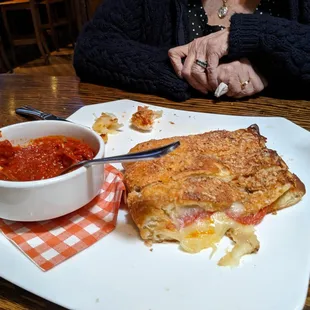 a plate of food and a bowl of soup