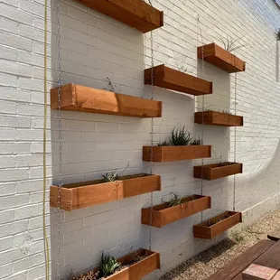 Outdoor seating area with cute planter boxes