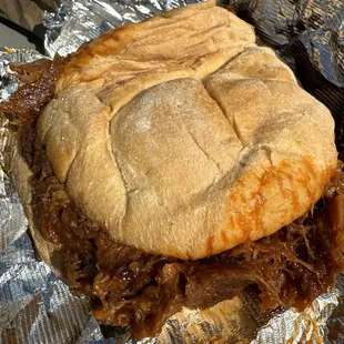 Pulled pork sandwich! Moist, delicious and big enough for two! Roll was great too! Not a potato roll. Just a plain roll, just right.