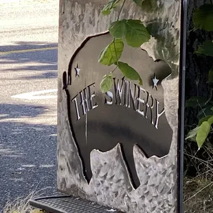 a sign for the swinery