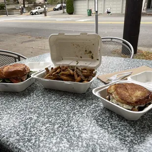 The whole spread (Swinery Burger, fries, and Fair Burger)