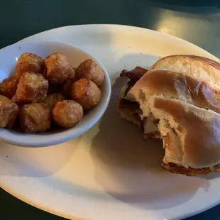 Build Your Own - grilled chicken, bacon, Swiss, and BBQ on a brioche bun with sweet potato tots