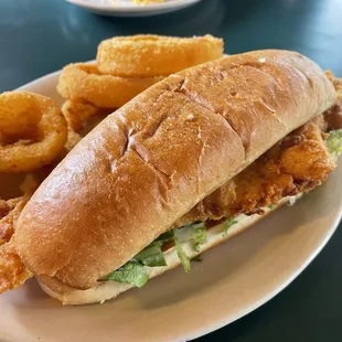 Fried fish sandwich and onion rings