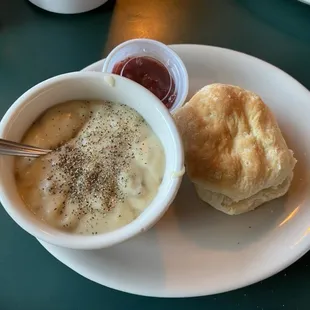 Biscuit, sausage gravy and homemade strawberry preserves