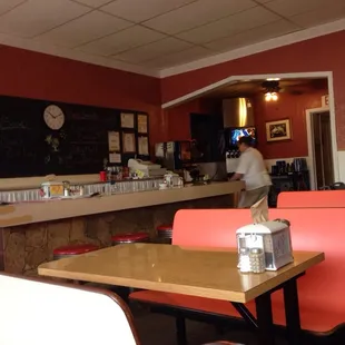 a man working in the background