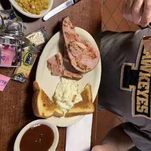 Ham steak dinner... My husband said it was very good. They were a little light on the mashed potatoes could&apos;ve been a bigger serving.