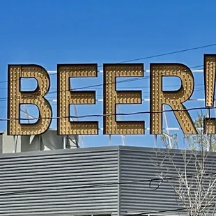 the sign for beer
