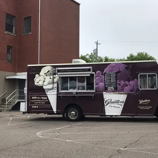 a food truck with purple ice cream