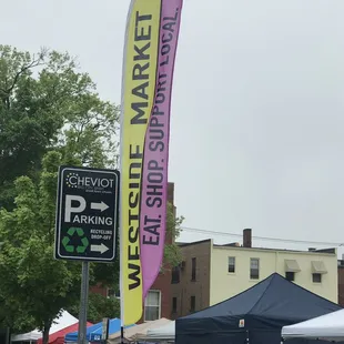 a sign for west side market