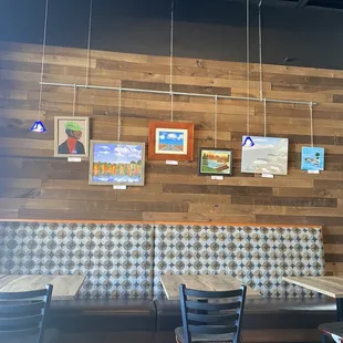 Booth seating with art work
