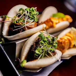 three buns on a tray