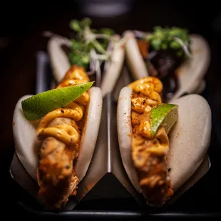 a close up view of three buns with different toppings