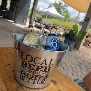 a bucket of local beer
