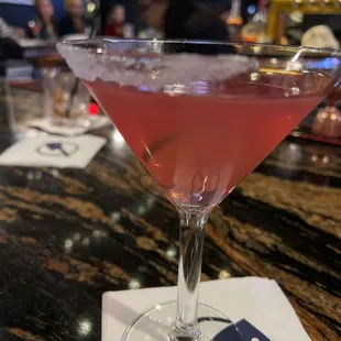 a cocktail in a martini glass
