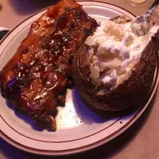 Half rack ribs with a baked potato