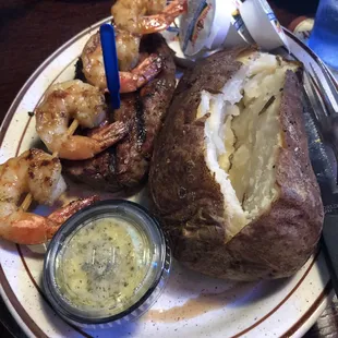 10 oz sirloin with grilled shrimp and jumbo baked potato