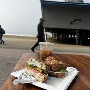 Everything bagel with avocado and tomato and cold brew