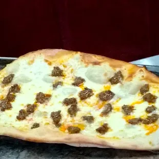 Long Sojuk n Cheese hot just outta oven Delicious  Love  only 5 bucks