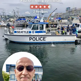 a man in sunglasses and a police boat