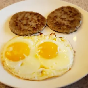 eggs, sausage and toast on a plate