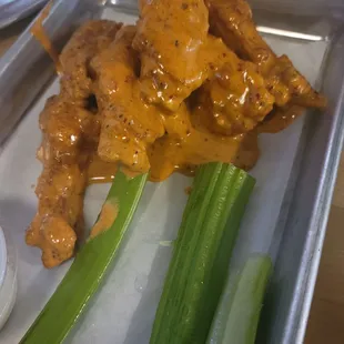 Creamy Buffalo wings fried hard. Yum