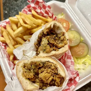 Fried Oysters Poboy Sandwich, comes with a side of French fries. Sooo good!