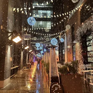 snow falling in the city