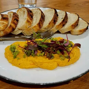Roasted carrot hummus, pretty color but couldn't taste any hint of carrot, the bread was perfect though!