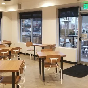 a restaurant with tables and chairs