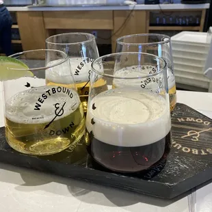 Sampler of 4 brews, 6 oz each for $18.00 Served on cute tray and glasses: Coloradan Mexican Lager, Kolsch, Westbound IPA, and Nitro Stout