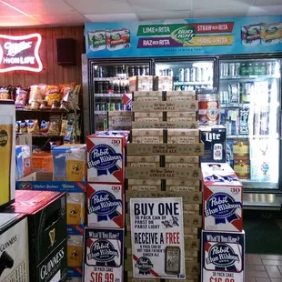 a store filled with boxes of beer