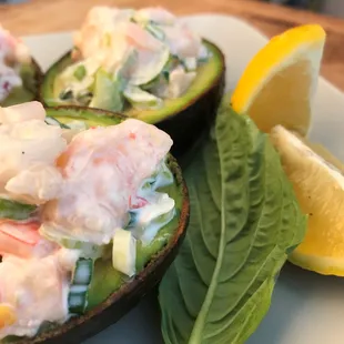 New and exciting menu items coming next week Shrimp topped avocado...Simply delicious.