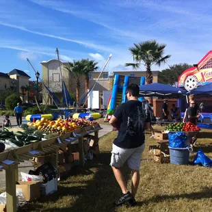 people shopping for produce