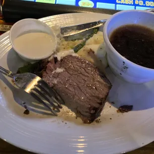 a plate of food and a cup of coffee