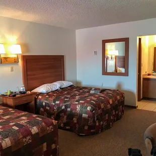 Two queen room, dogs allowed.