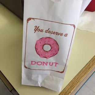 a bag with a donut on it