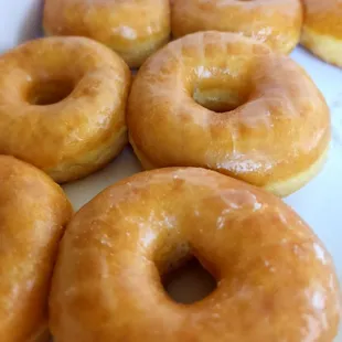 Fresh glazed donuts! Very soft and delicious.