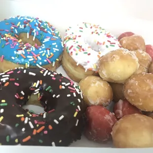 a variety of donuts in a box