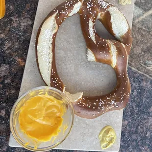 a pretzel with mustard