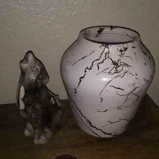 The new wolf figurine with an old horse hair vase