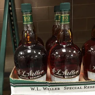 three bottles of whiskey on display