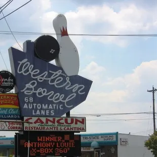 a sign for a bowling alley