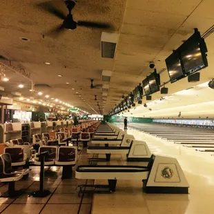 rows of bowling lanes in a bowling alley