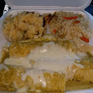 Enchiladas with roasted chicken inside, rice and potatoes......excellent!!!!