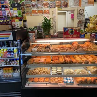 a display of various types of donuts