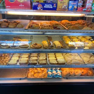 Baking goods: donuts, croissants, muffins, pate chaud, pound cakes, etc