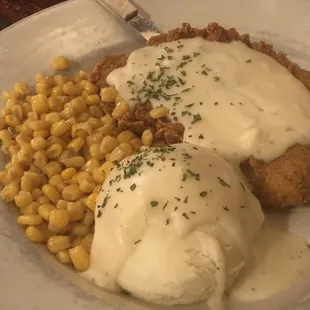 Chicken fried chicken with corn and mashed potatoes