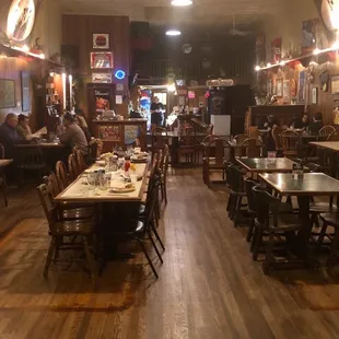Dining room.  Pool table along the right at the entrance.