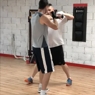 Jon and Erez working out some problems, mostly their footwork problems.